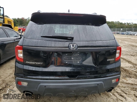 2019 Honda Passport Touring z VIN 5FNYF7H96KB000201, wystawiony jako Copart lot #73759134 z przebiegiem Nie podano mil oraz Szkoda całkowita • Salvage title. Historia ofert i sprzedaży dostępna na DreamBid. Obrazek 6.