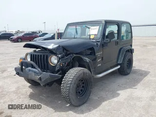 1999 Jeep Wrangler Sport z VIN 1J4FY19S0XP471848, wystawiony jako IAAI lot #42264563 z przebiegiem 280 121 mil mil oraz . Historia ofert i sprzedaży dostępna na DreamBid. Obrazek 2.