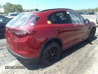 2019 Alfa Romeo Stelvio Ti with VIN ZASPAKBN1K7C49148, listed as a IAAI auction lot 42205054 with 47,338 mi miles and . Bid and sale history available at DreamBid. Image 4.