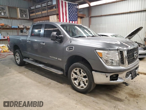 2016 Nissan Titan Platinum Reserve z VIN 1N6BA1F27GN517455, wystawiony jako Copart lot #51257125 z przebiegiem 156 675 mil mil oraz Czysty tytuł • Clean title. Historia ofert i sprzedaży dostępna na DreamBid. Obrazek 4.