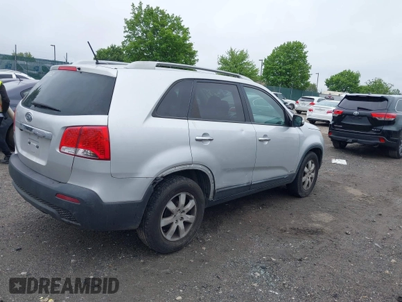 2011 Kia Sorento LX with VIN 5XYKTDA12BG059031, listed as a IAAI auction lot 42194720 with 220,000 mi miles. Bid and sale history available at carsss.com. Image 4.