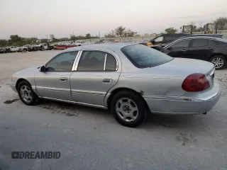2002 Lincoln Continental with VIN 1LNHM97VX2Y672516, listed as a Copart auction lot 75595354 with 154,361 mi miles and Salvage Title. Bid and sale history available at carsss.com. Image 2.