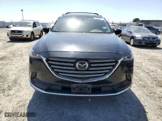 2018 Mazda CX-9 Signature with VIN JM3TCBEY9J0207557, listed as a Copart auction lot 52054325 with 158,992 mi miles and Clean Title. Bid and sale history available at carsss.com. Image 5.