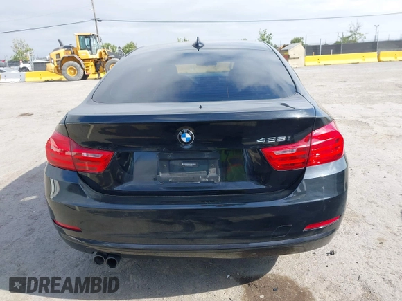 2015 BMW 4 Series 428i z VIN WBA4A9C5XFD416873, wystawiony jako IAAI lot #42108645 z przebiegiem 93 433 mil mil oraz . Historia ofert i sprzedaży dostępna na DreamBid. Obrazek 17.