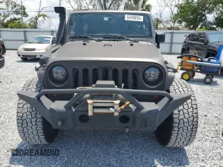 2012 Jeep Wrangler Unlimited Altitude with VIN 1C4HJWEG6CL209870, listed as a Copart auction lot 56490065 with 155,395 mi miles and Clean title. Bid and sale history available at DreamBid. Image 5.