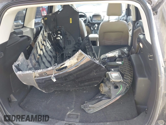 2016 Ford Escape Titanium with VIN 1FMCU9JX4GUB38303, listed as a IAAI auction lot 41788421 with 138,511 mi miles and . Bid and sale history available at DreamBid. Image 12.
