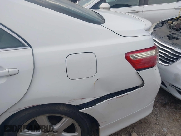 2007 Toyota Camry CE with VIN 4T1BE46K37U598061, listed as a IAAI auction lot 42132451 with 293,648 mi miles and . Bid and sale history available at DreamBid. Image 12.