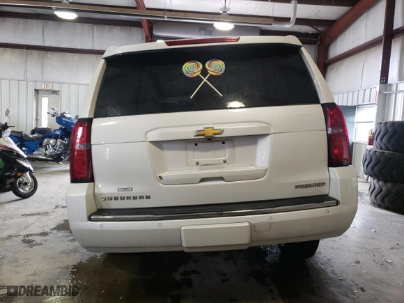 2020 Chevrolet Suburban Premier with VIN 1GNSKJKC5LR174248, listed as a Copart auction lot 73365664 with 124,755 mi miles and Salvage Title. Bid and sale history available at carsss.com. Image 6.