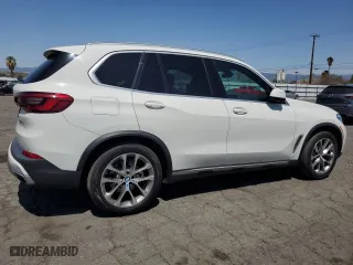 2019 BMW X5 xDrive40i with VIN 5UXCR6C52KLL35774, listed as a Copart auction lot 51802385 with 99,311 mi miles and Clean Title. Bid and sale history available at carsss.com. Image 3.