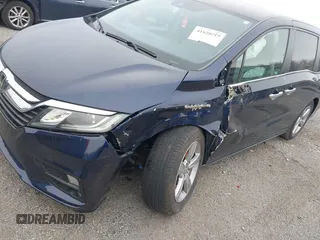 2020 Honda Odyssey EX-L with VIN 5FNRL6H70LB055122, listed as a IAAI auction lot 41620219 with 129,582 mi miles. Bid and sale history available at carsss.com. Image 6.