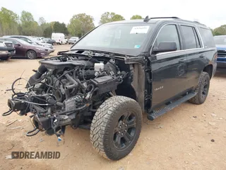 2017 Chevrolet Tahoe LT with VIN 1GNSKBKCXHR388181, listed as a IAAI auction lot 41936609 with 94,783 mi miles and . Bid and sale history available at DreamBid. Image 2.