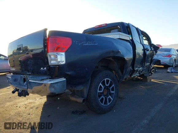 2012 Toyota Tundra z VIN 5TFUY5F13CX259746, wystawiony jako IAAI lot #41290747 z przebiegiem 190 583 mil mil oraz . Historia ofert i sprzedaży dostępna na DreamBid. Obrazek 4.