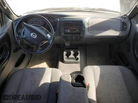 2003 Mazda B-Series Truck z VIN 4F4YR46U93TM21400, wystawiony jako Copart lot #56239985 z przebiegiem 133 893 mil mil oraz Szkoda całkowita • Salvage title. Historia ofert i sprzedaży dostępna na DreamBid. Obrazek 8.