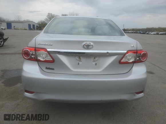 2012 Toyota Corolla L with VIN 2T1BU4EE0CC800140, listed as a Copart auction lot 52686455 with 203,407 mi miles and Salvage Title. Bid and sale history available at carsss.com. Image 6.