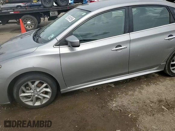 2014 Nissan Sentra SR z VIN 3N1AB7APXEY259601, wystawiony jako Copart lot #59144195 z przebiegiem 99 834 mil mil oraz Szkoda całkowita • Salvage title. Historia ofert i sprzedaży dostępna na DreamBid. Obrazek 13.