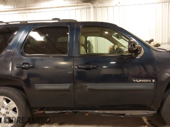 2007 GMC Yukon SLT z VIN 1GKFK130X7J115798, wystawiony jako IAAI lot #42039550 z przebiegiem 263 539 mil mil oraz . Historia ofert i sprzedaży dostępna na DreamBid. Obrazek 14.
