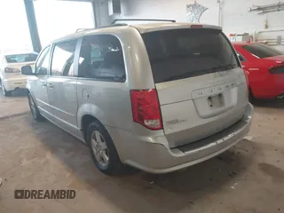 2012 Dodge Grand Caravan SXT with VIN 2C4RDGCG8CR139087, listed as a IAAI auction lot 41090171 with 202,461 mi miles and . Bid and sale history available at DreamBid. Image 3.