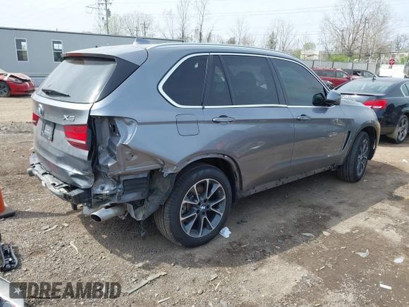 2017 BMW X5 xDrive35i with VIN 5UXKR0C33H0V81489, listed as a IAAI auction lot 42065076 with 65,900 mi miles and . Bid and sale history available at DreamBid. Image 4.