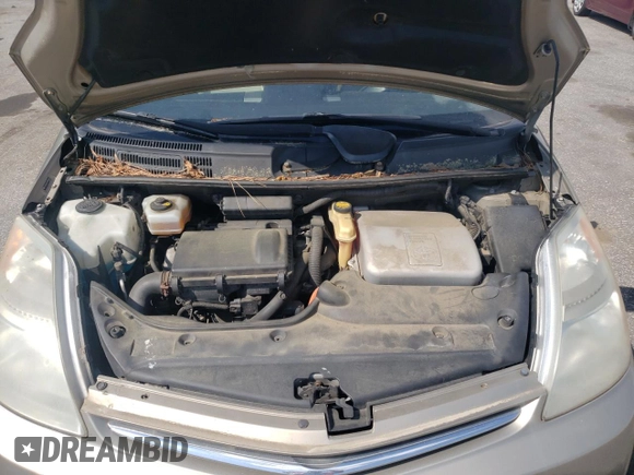 2007 Toyota Prius z VIN JTDKB20U273283642, wystawiony jako Copart lot #55244125 z przebiegiem 144 123 mil mil oraz Szkoda całkowita • Salvage title. Historia ofert i sprzedaży dostępna na DreamBid. Obrazek 11.