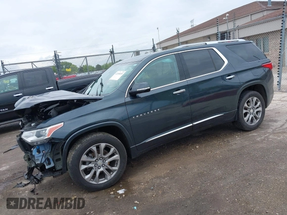 2018 Chevrolet Traverse Premier z VIN 1GNEVJKW4JJ240024, wystawiony jako IAAI lot #42369659 z przebiegiem 160 147 mil mil oraz . Historia ofert i sprzedaży dostępna na DreamBid. Obrazek 2.