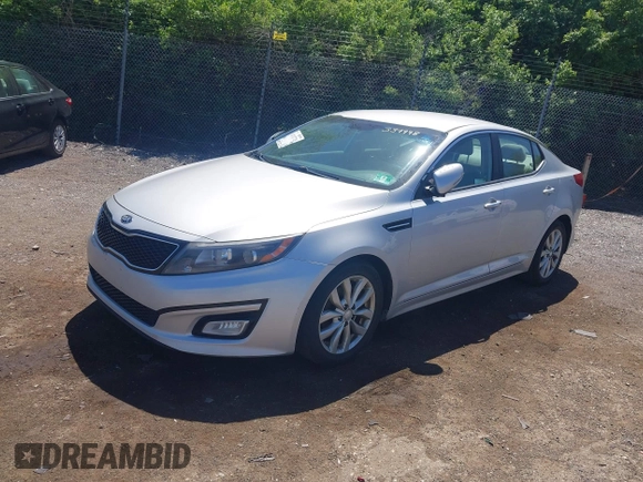 2014 Kia Optima LX with VIN 5XXGM4A72EG339998, listed as a IAAI auction lot 42132720 with 186,989 mi miles. Bid and sale history available at carsss.com. Image 2.