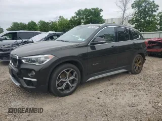 2016 BMW X1 xDrive28i z VIN WBXHT3C35G5E47007, wystawiony jako Copart lot #60601835 z przebiegiem 86 880 mil mil oraz Szkoda całkowita • Salvage title. Historia ofert i sprzedaży dostępna na DreamBid. Obrazek 1.