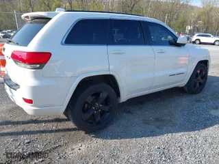 2015 Jeep Grand Cherokee Altitude with VIN 1C4RJFAG1FC797157, listed as a IAAI auction lot 42021139 with 148,491 mi miles. Bid and sale history available at carsss.com. Image 4.
