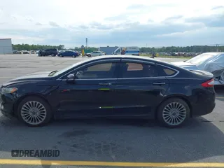 2016 Ford Fusion Titanium with VIN 3FA6P0K90GR179528, listed as a IAAI auction lot 42181213 with 230,264 mi miles. Bid and sale history available at carsss.com. Image 14.