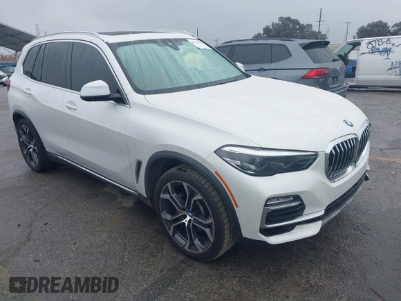 2021 BMW X5 sDrive40i with VIN 5UXCR4C03M9F24817, listed as a IAAI auction lot 41512172 with 54,867 mi miles. Bid and sale history available at carsss.com. Image 1.