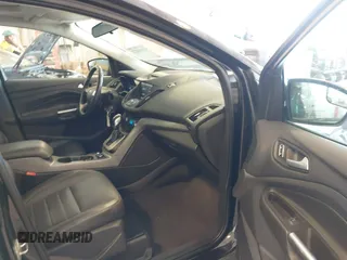 2014 Ford Escape SE with VIN 1FMCU9G95EUA16328, listed as a IAAI auction lot 42464235 with 108,570 mi miles and . Bid and sale history available at DreamBid. Image 5.