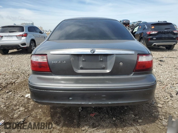 2005 Mercury Sable LS z VIN 1MEFM55S75A619345, wystawiony jako Copart lot #55858325 z przebiegiem Nie podano mil oraz Szkoda całkowita • Salvage title. Historia ofert i sprzedaży dostępna na DreamBid. Obrazek 6.