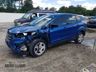 2018 Ford Escape S with VIN 1FMCU0F76JUC55683, listed as a Copart auction lot 57614815 with 70,557 mi miles and Salvage title. Bid and sale history available at DreamBid. Image 1.