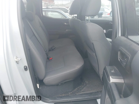 2019 Toyota Tacoma SR z VIN 3TMCZ5AN1KM206969, wystawiony jako IAAI lot #41951159 z przebiegiem 94 875 mil mil oraz . Historia ofert i sprzedaży dostępna na DreamBid. Obrazek 8.
