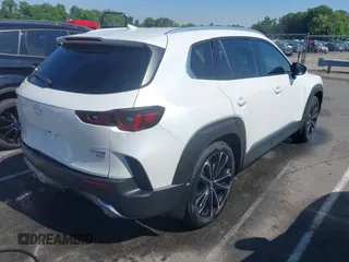 2024 Mazda CX-50 Premium Plus with VIN 7MMVABEY9RN207368, listed as a IAAI auction lot 42211942 with 13,940 mi miles and . Bid and sale history available at DreamBid. Image 4.