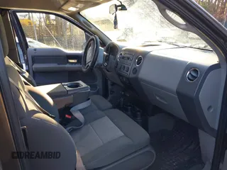 2007 Ford F-150 STX with VIN 1FTRX14W17FB65876, listed as a IAAI auction lot 41318821 with 206,254 mi miles. Bid and sale history available at carsss.com. Image 5.