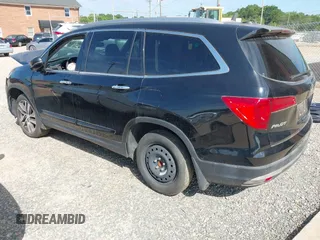 2017 Honda Pilot Touring with VIN 5FNYF5H91HB038268, listed as a IAAI auction lot 42786448 with 62,195 mi miles and . Bid and sale history available at DreamBid. Image 3.