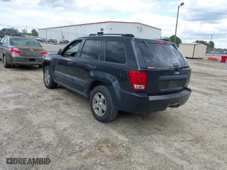 2005 Jeep Grand Cherokee Laredo with VIN 1J4GS48K65C570266, listed as a IAAI auction lot 42026624 with 162,512 mi miles. Bid and sale history available at carsss.com. Image 3.