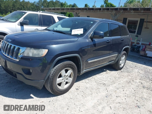 2012 Jeep Grand Cherokee Laredo with VIN 1C4RJEAG9CC223167, listed as a IAAI auction lot 42136098 with 152,715 mi miles. Bid and sale history available at carsss.com. Image 18.