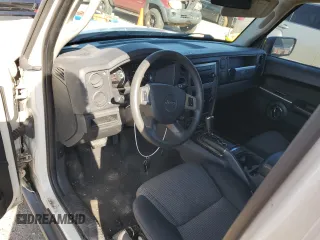 2010 Jeep Commander Sport with VIN 1J4RH4GK9AC113888, listed as a Copart auction lot 84553544 with 208,109 mi miles and Salvage title. Bid and sale history available at DreamBid. Image 8.
