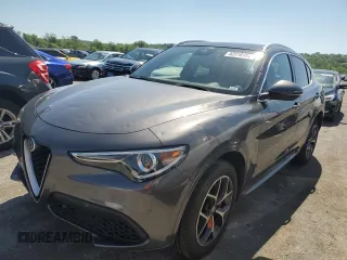 2020 Alfa Romeo Stelvio Ti z VIN ZASPAKBN8L7C91852, wystawiony jako Copart lot #52318184 z przebiegiem 31 324 mil mil oraz Szkody całkowita. Historia ofert i sprzedaży dostępna na DreamBid. Obrazek 1.