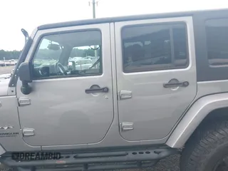 2016 Jeep Wrangler Unlimited Sahara with VIN 1C4BJWEG5GL117872, listed as a IAAI auction lot 42692798 with 119,819 mi miles and . Bid and sale history available at DreamBid. Image 14.