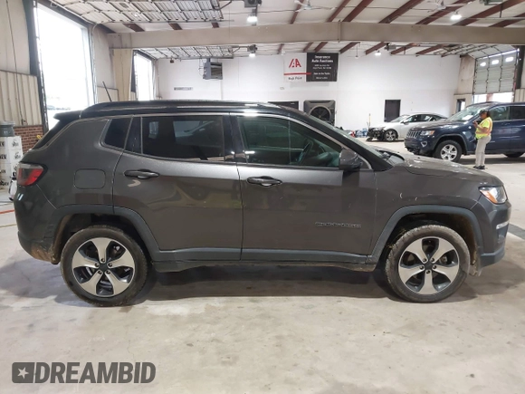 2018 Jeep Compass Latitude with VIN 3C4NJDBB9JT116391, listed as a IAAI auction lot 41953729 with 129,331 mi miles and . Bid and sale history available at DreamBid. Image 13.