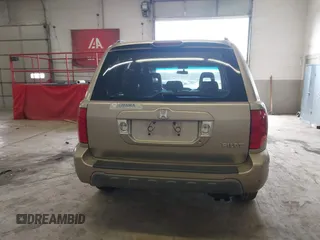 2005 Honda Pilot EX-L with VIN 5FNYF18565B019345, listed as a IAAI auction lot 41641423 with 282,099 mi miles. Bid and sale history available at carsss.com. Image 16.