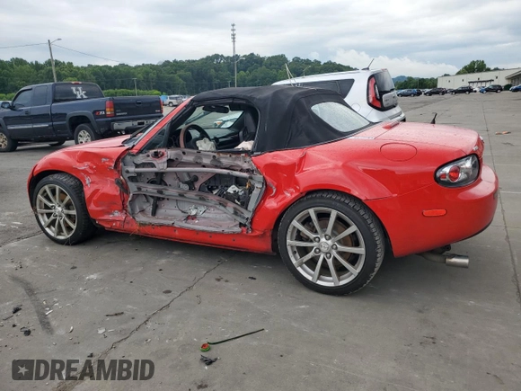 2006 Mazda MX-5 Miata Grand Touring with VIN JM1NC25F260102320, listed as a Copart auction lot 63183595 with 205,383 mi miles and Salvage title. Bid and sale history available at DreamBid. Image 2.