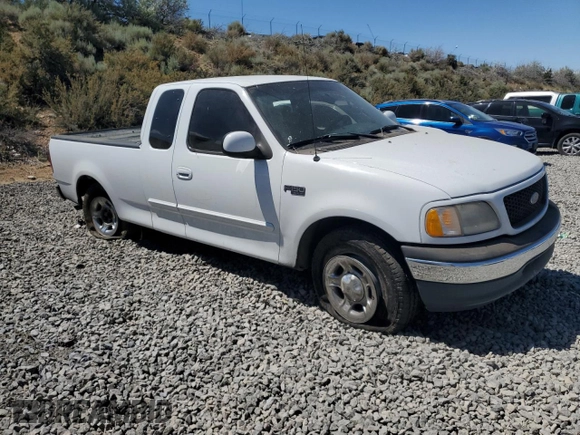 2001 Ford F-150 XL with VIN 1FTZX17251NB12930, listed as a Copart auction lot 62517295 with Not provided miles and Salvage title. Bid and sale history available at DreamBid. Image 4.