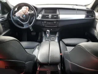 2012 BMW X6 50i z VIN 5UXFG8C53CL590367, wystawiony jako Copart lot #86650664 z przebiegiem Nie podano mil oraz Szkoda całkowita • Salvage title. Historia ofert i sprzedaży dostępna na DreamBid. Obrazek 8.