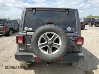 2019 Jeep Wrangler Unlimited Sahara with VIN 1C4HJXENXKW521630, listed as a Copart auction lot 56196145 with 56,753 mi miles and Salvage title. Bid and sale history available at DreamBid. Image 6.