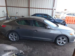 2014 Acura ILX Premium with VIN 19VDE1F51EE006621, listed as a IAAI auction lot 41984539 with 165,585 mi miles and . Bid and sale history available at DreamBid. Image 13.