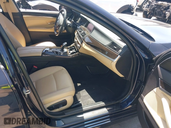 2016 BMW 5 Series 535i xDrive with VIN WBA5B3C59GG256290, listed as a IAAI auction lot 42381402 with 82,299 mi miles and . Bid and sale history available at DreamBid. Image 5.