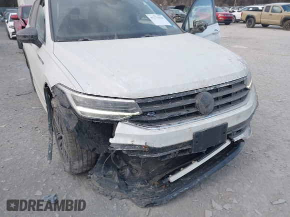 2022 Volkswagen Tiguan SE R-Line Black с VIN 3VV8B7AX2NM089612, выставлен на аукционе IAAI как лот 41271934 с пробегом 30 799 миль миль и . История ставок и продаж доступна на DreamBid. Изображение 6.